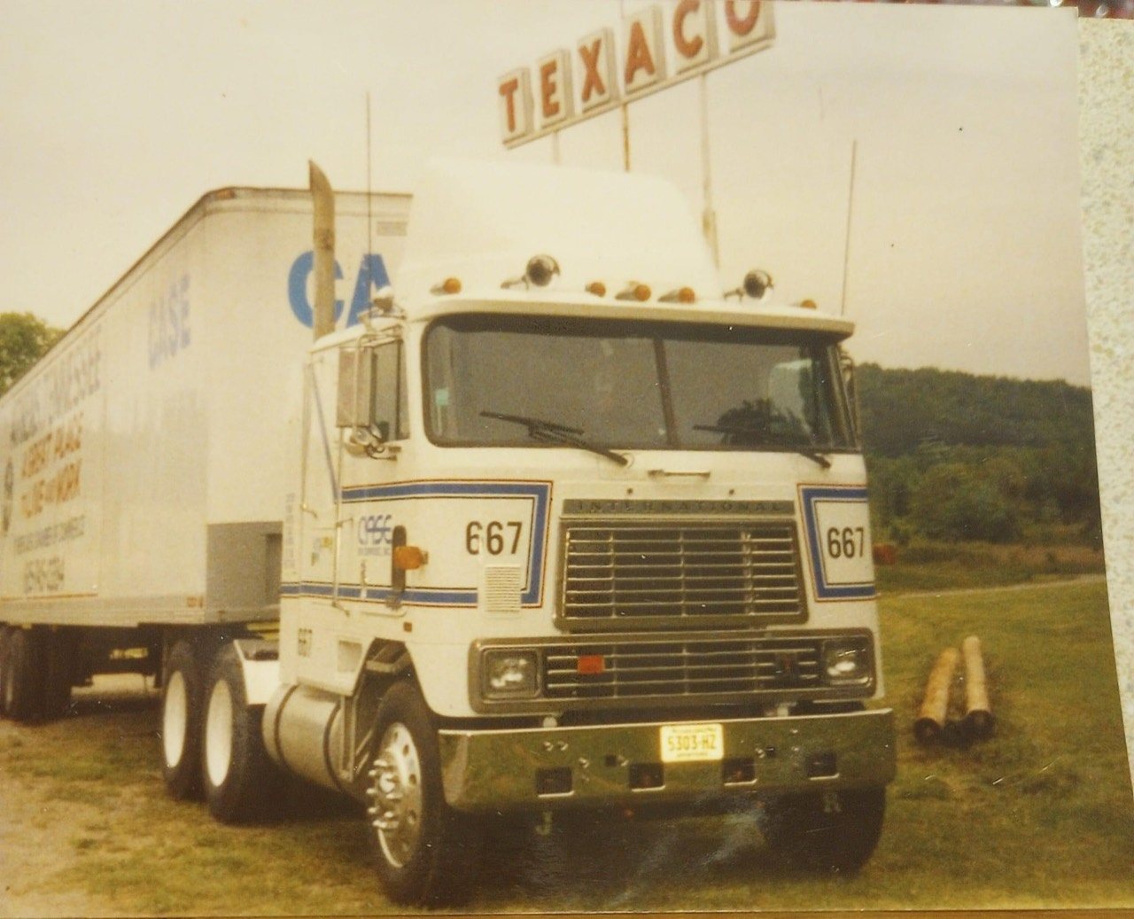Historical Case Enterprises truck at a Texaco station
