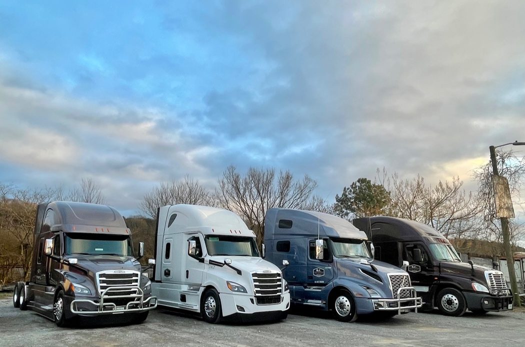 R.C. Transport truck lineup in the yard