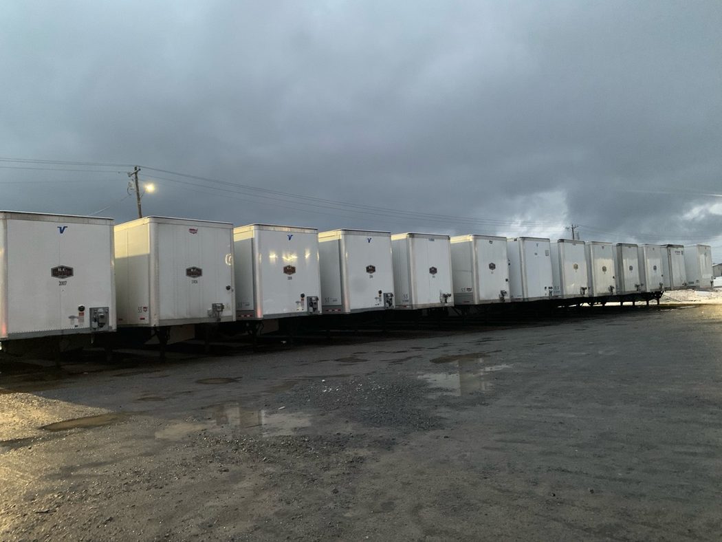R.C. Transport trailers lined up after rain